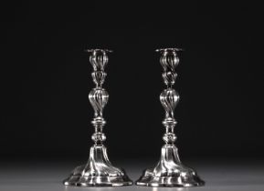 Pair of solid silver candlesticks, hallmarked 835 and three diamond hallmark, 20th century.