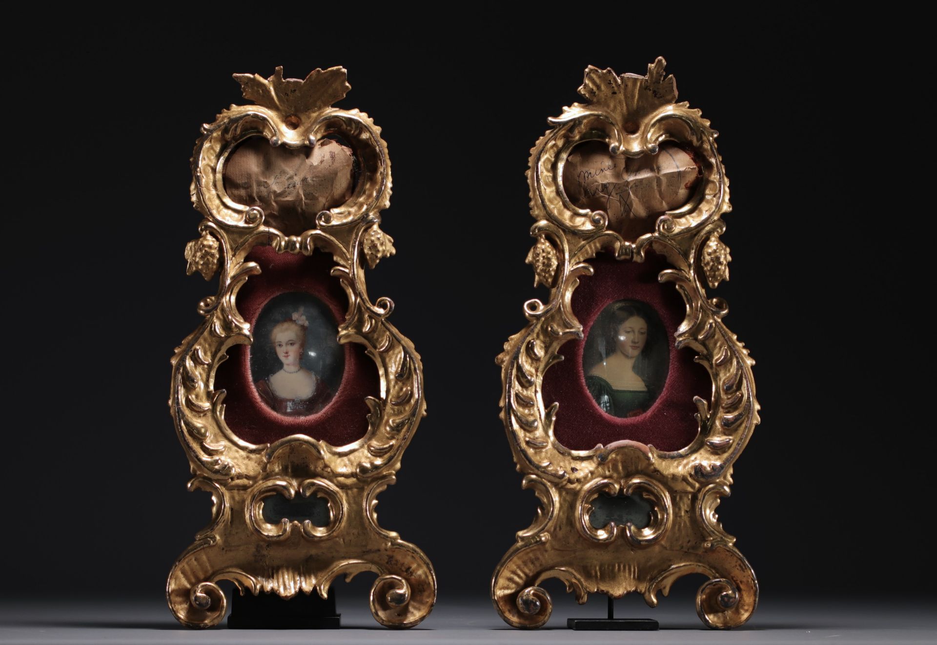 A pair of carved and gilt wood frames, one containing a miniature painting of a lady's portrait, 19t