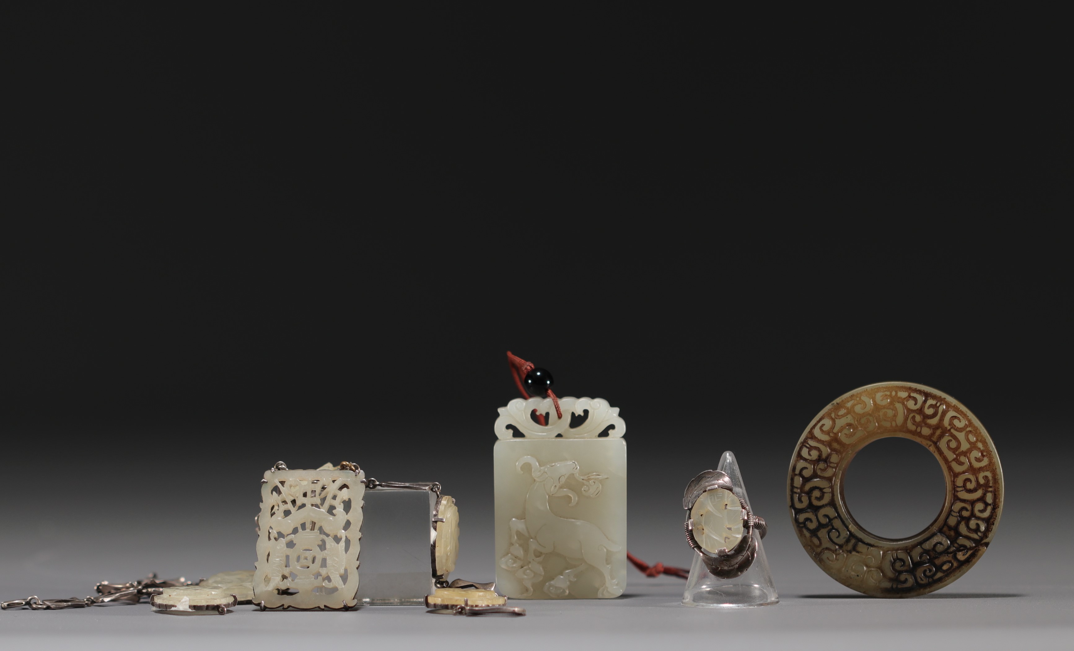 China - Set of various carved jade objects.