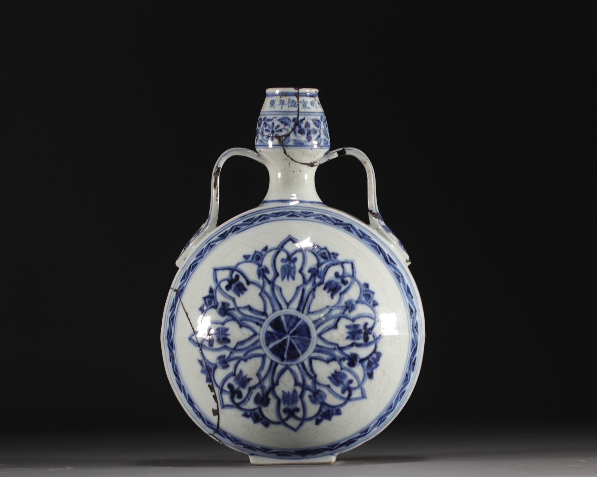 China - "Gourd" vase in blue-white porcelain, Xuande mark, Ming.