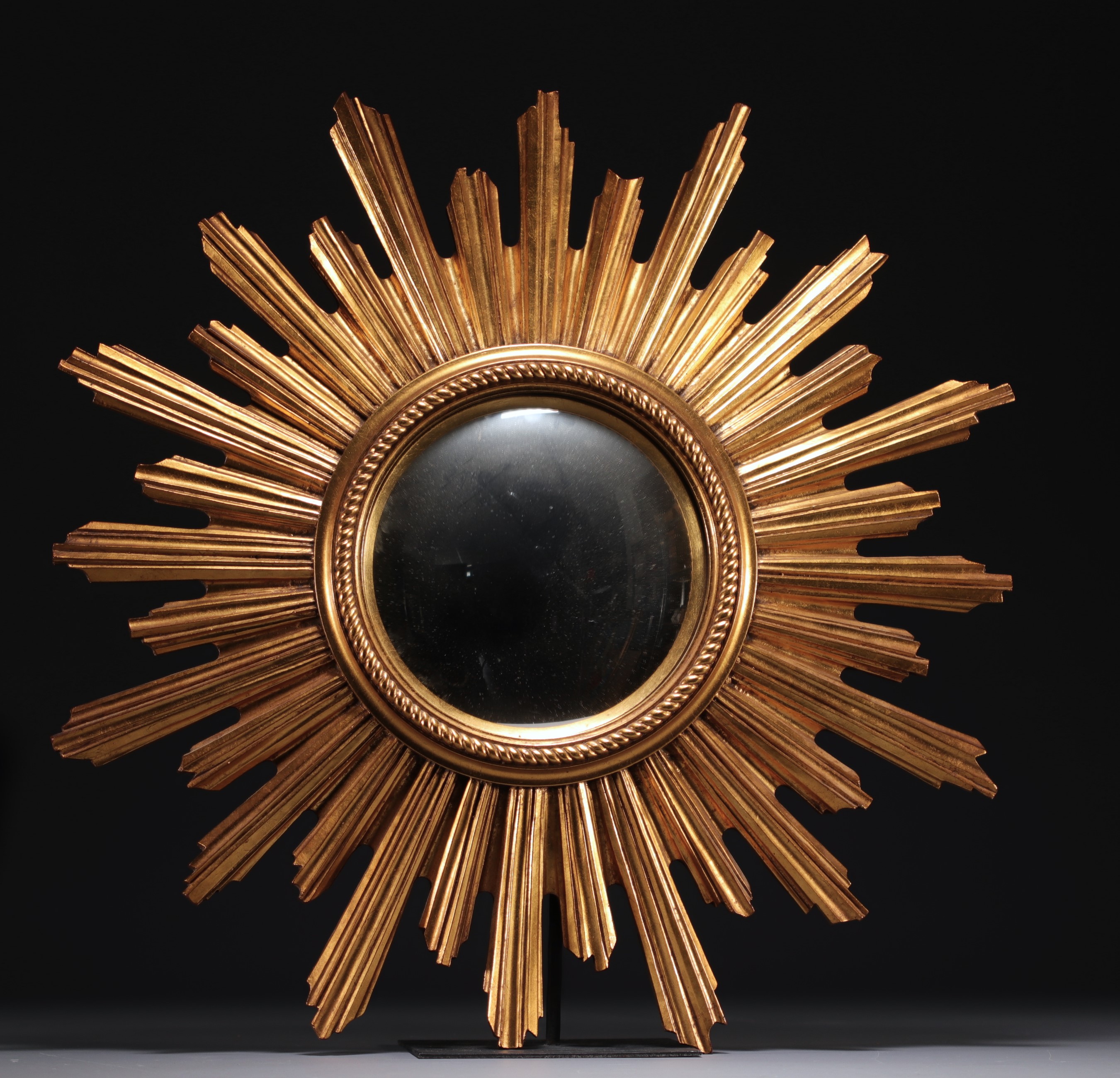 Sun mirror in gilded resin, circa 1960/70.