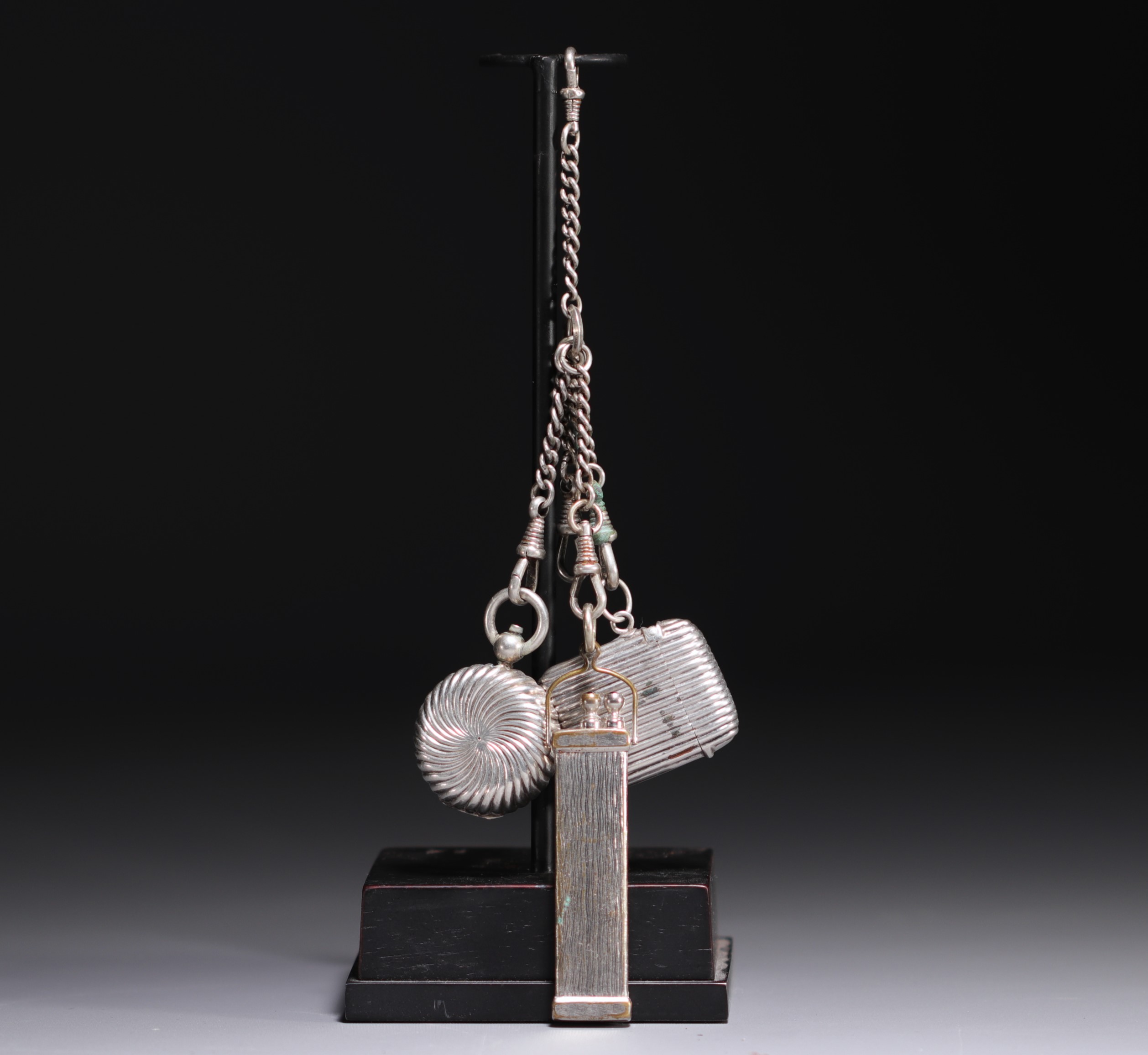 Silver and silver-plated metal chatelaine, 20th century.