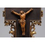 Christ in carved wood on a gilded wood frame, late 17th century (frame attached).