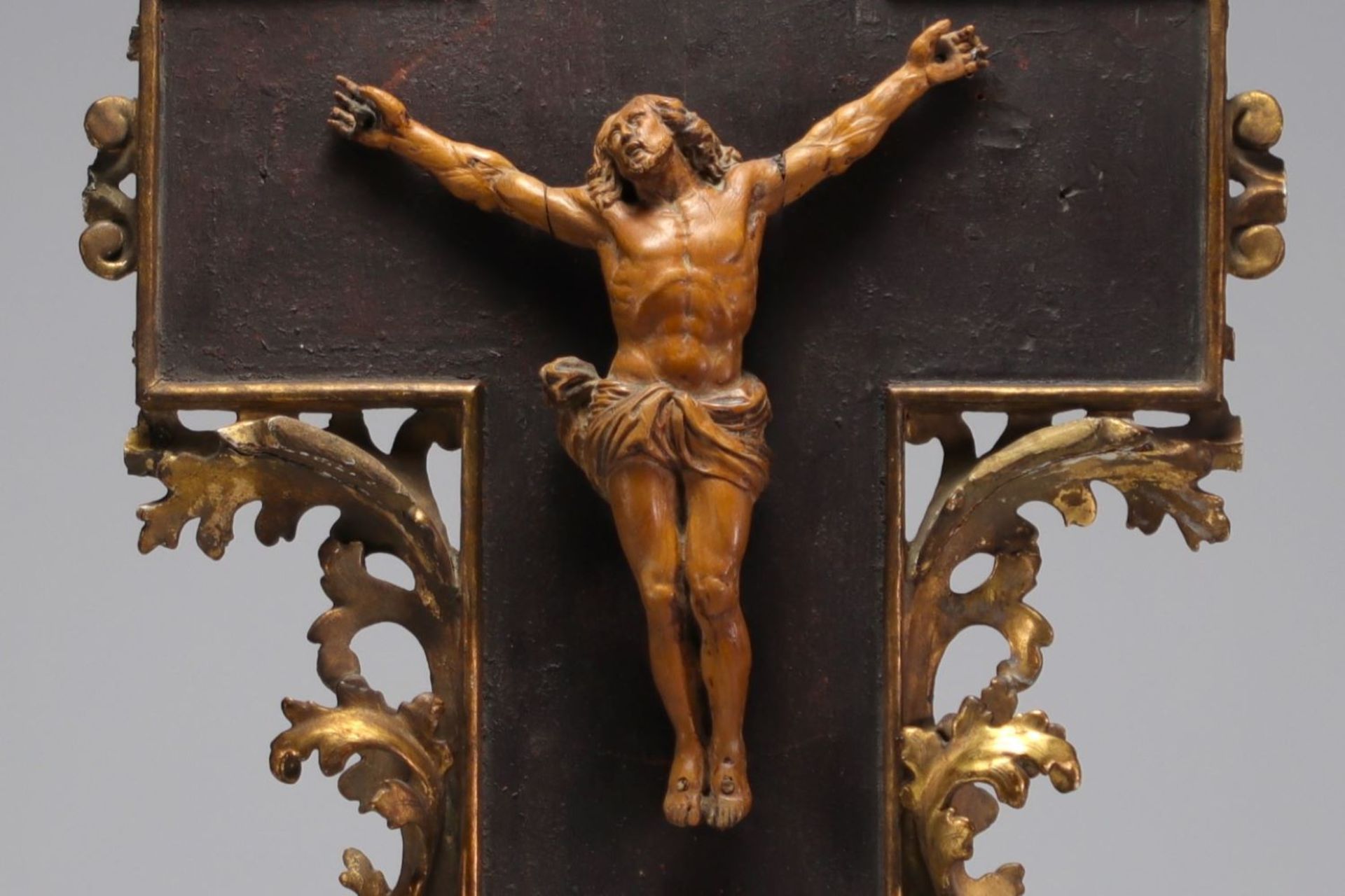 Christ in carved wood on a gilded wood frame, late 17th century (frame attached).