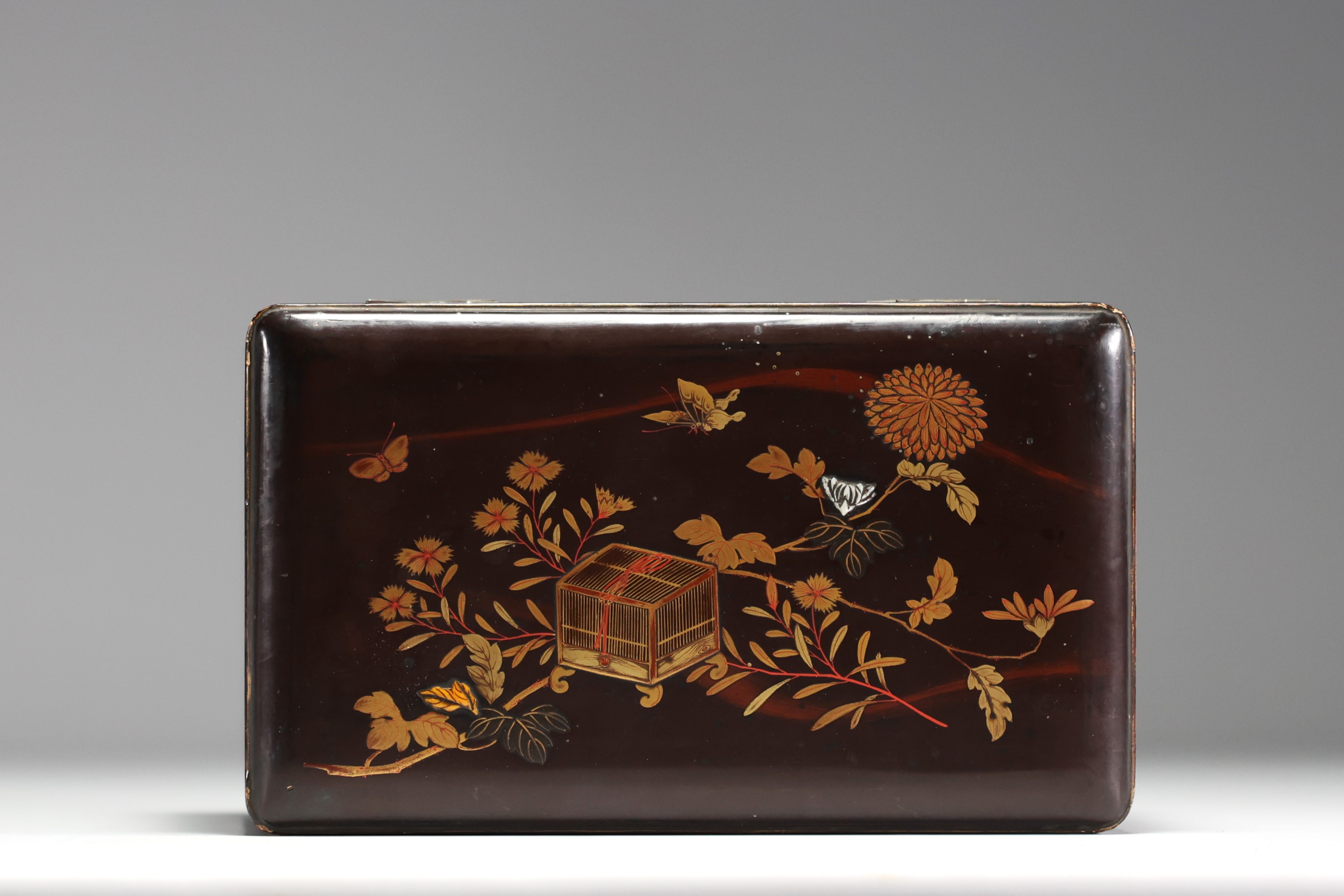 Japan - Lacquer tea chest decorated with birds and insects, circa 1900.