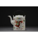 China - Porcelain teapot with dragon design, circa 1900.