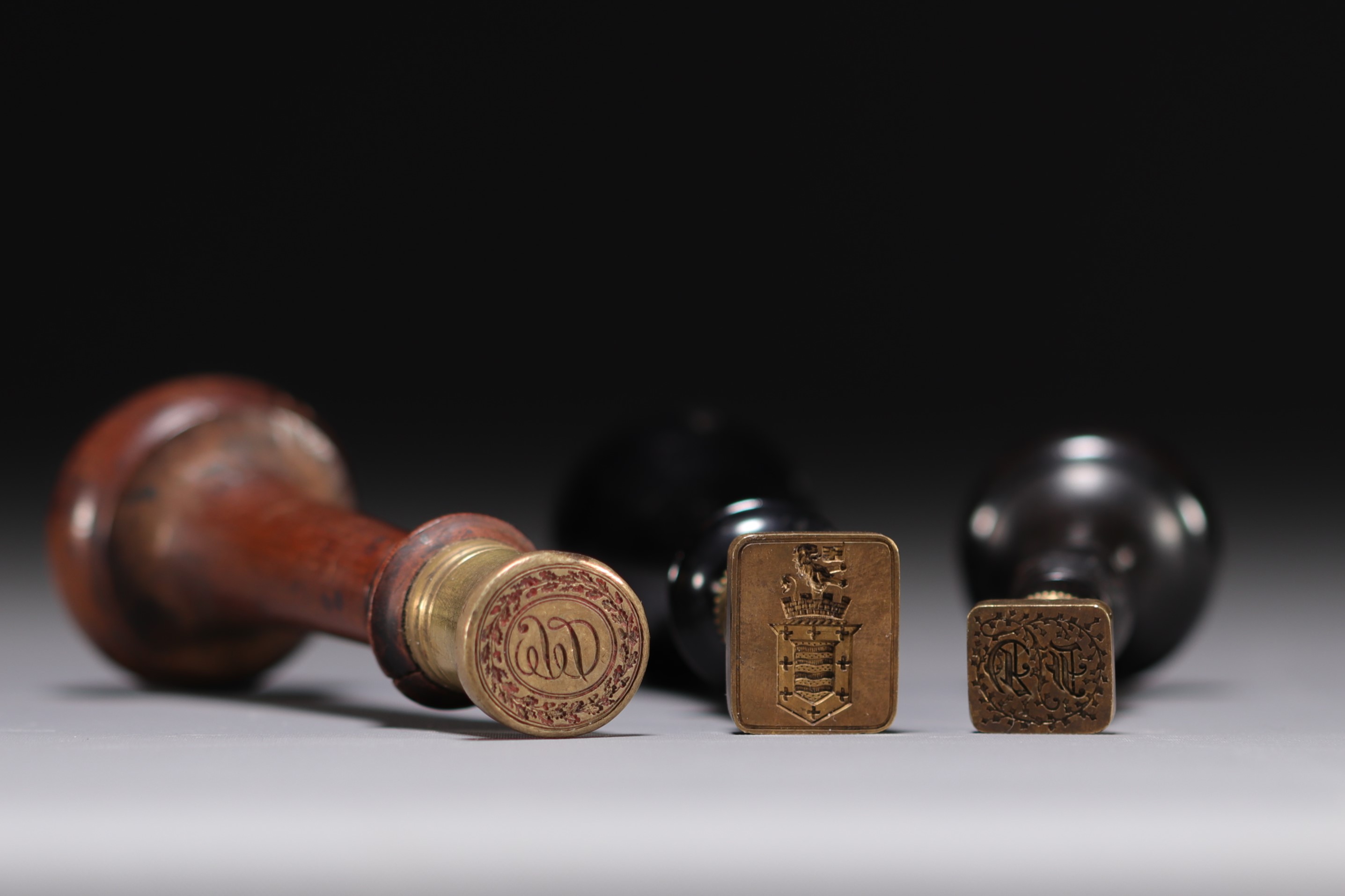 Set of three monogrammed wax seals.