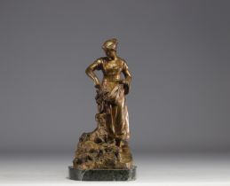 T. CARTIER (1879-1936) "The shepherdess and her sheep" bronze with golden patina.