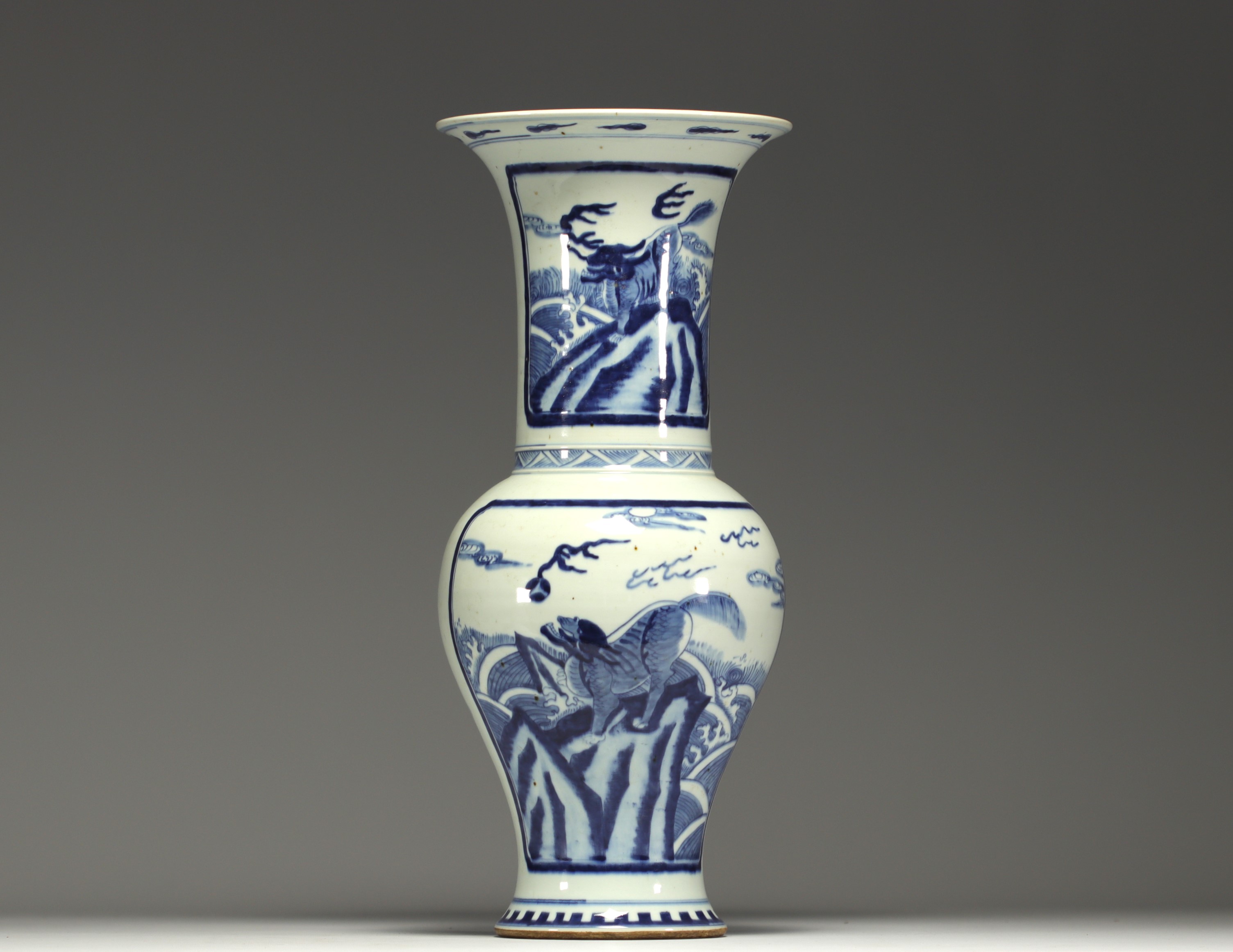 China - Large white-blue vase with chimera design.
