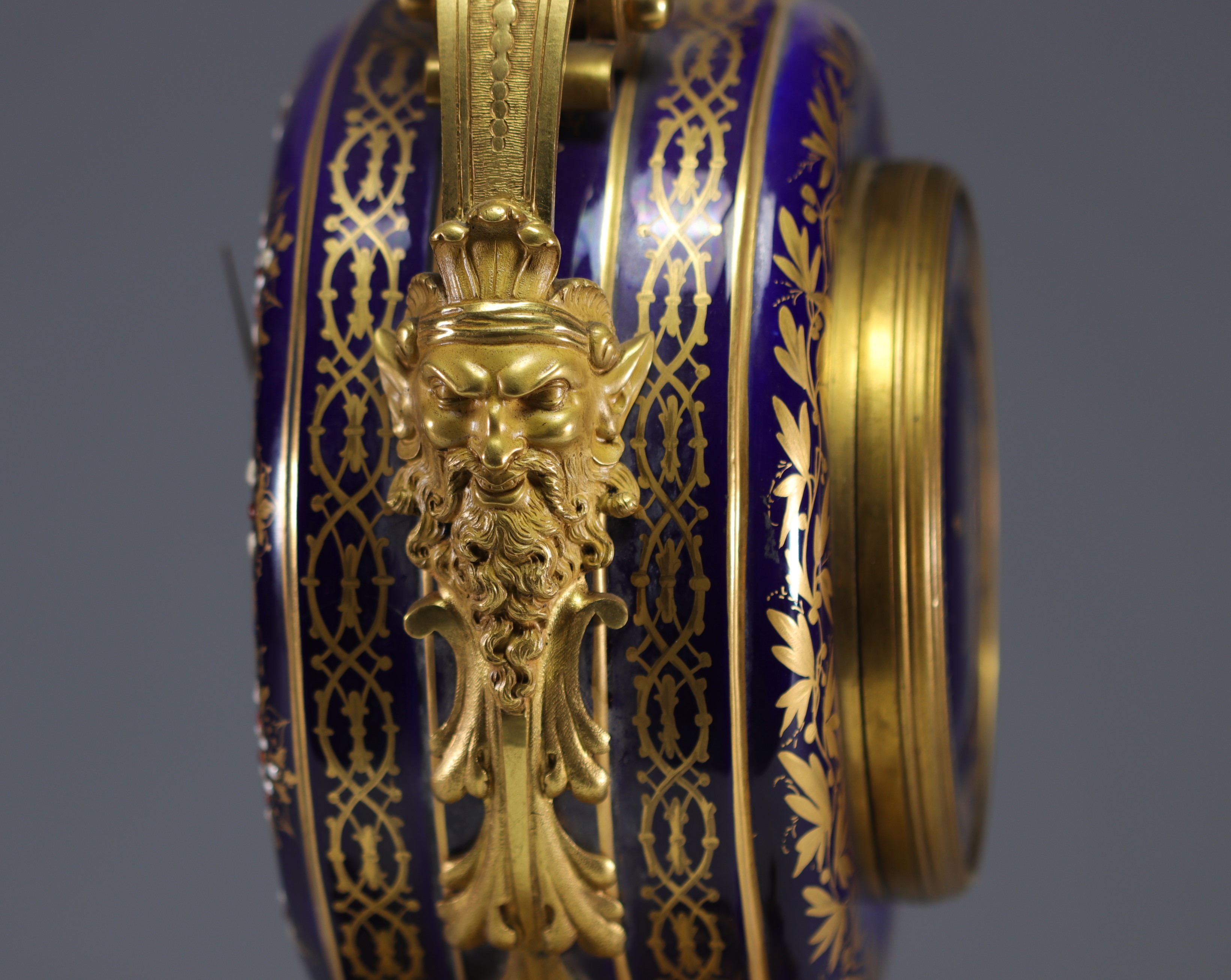 A rare Sevres porcelain and gilt bronze clock decorated with cherubs. - Image 2 of 8