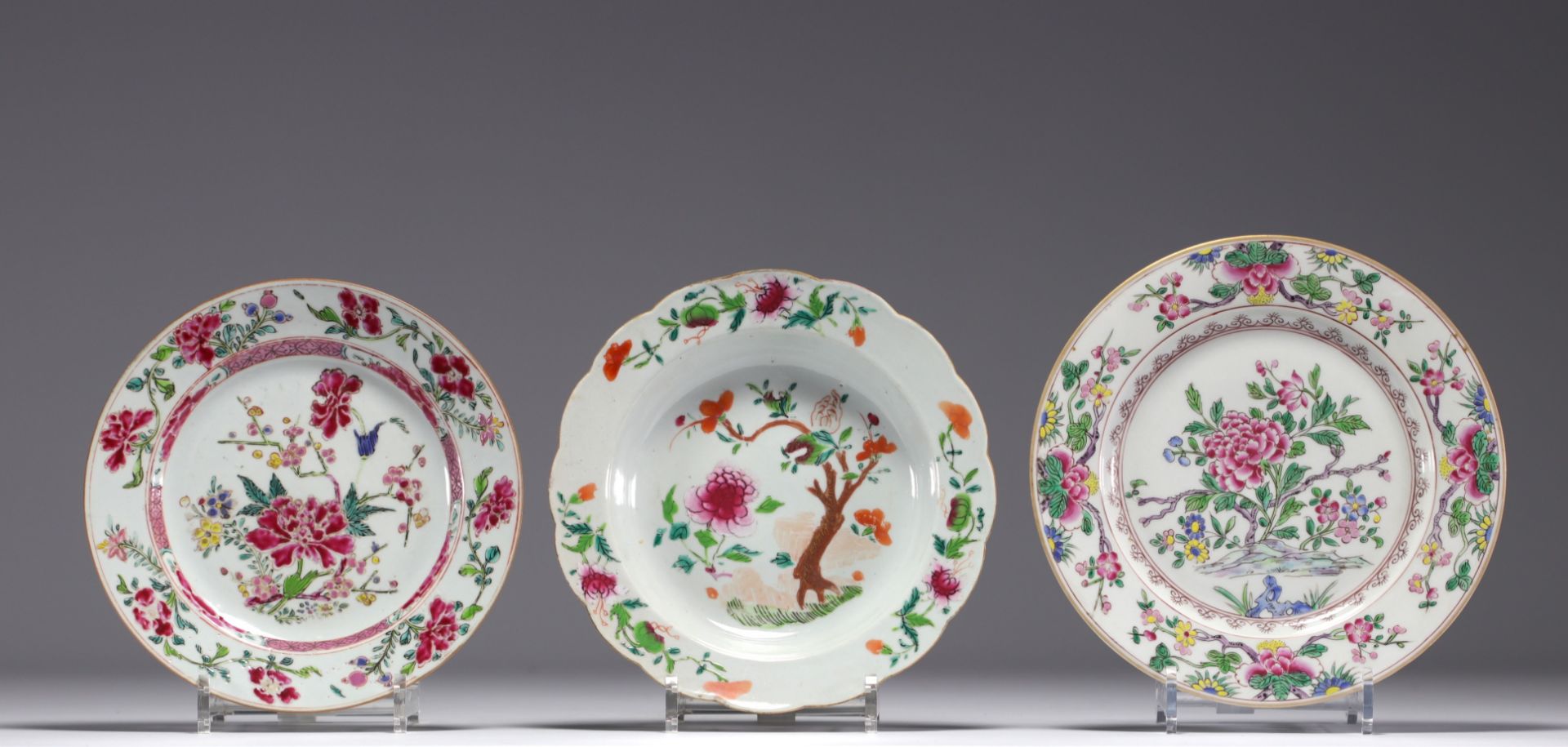 China - Set of three Famille Rose porcelain plates with floral decoration.