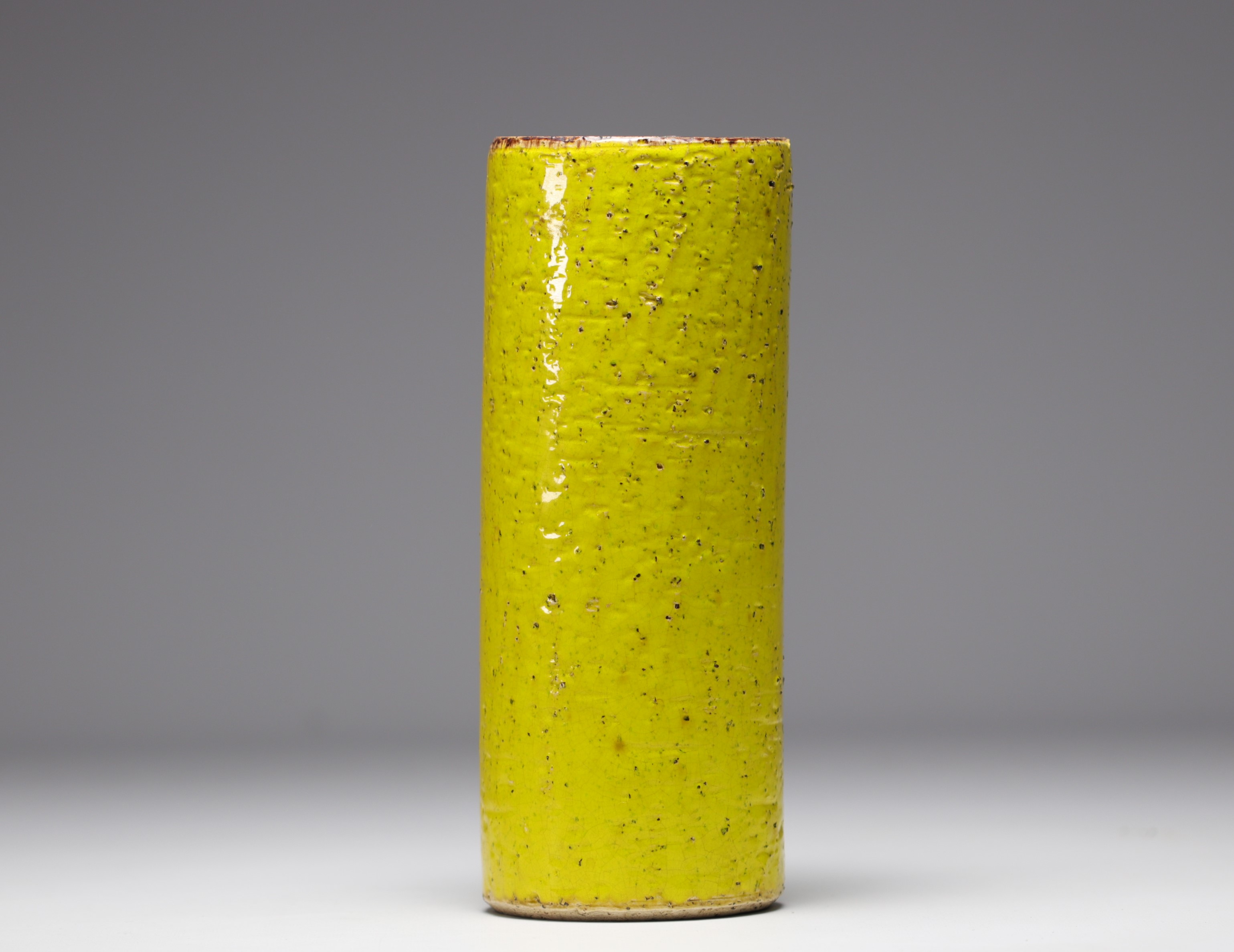 Yellow glazed ceramic scroll vase, circa 1950.