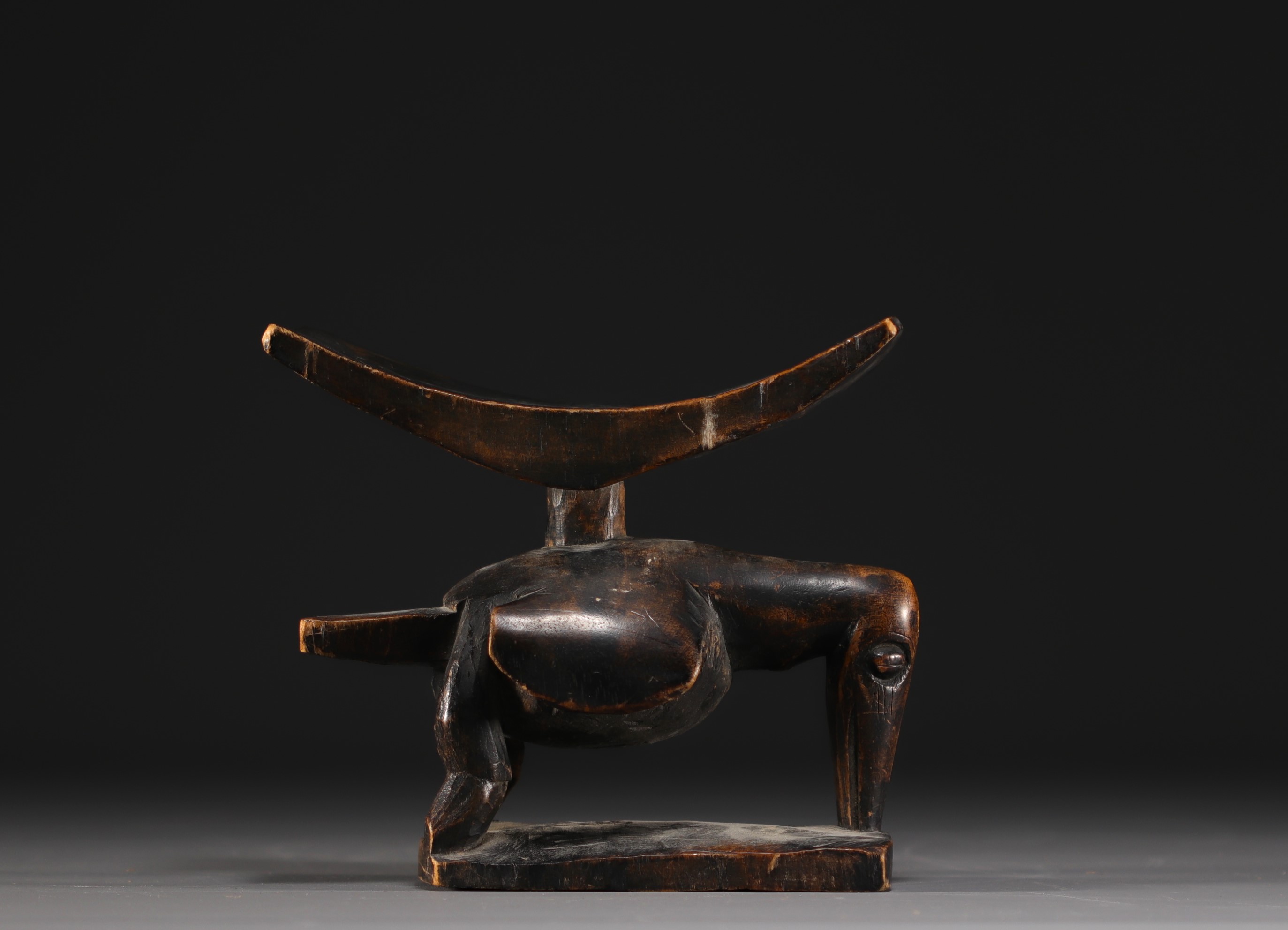 Africa - Neck rest carved in the shape of a bird.