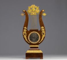 Mahogany veneered and gilt bronze "Lyre" clock, 19th century.