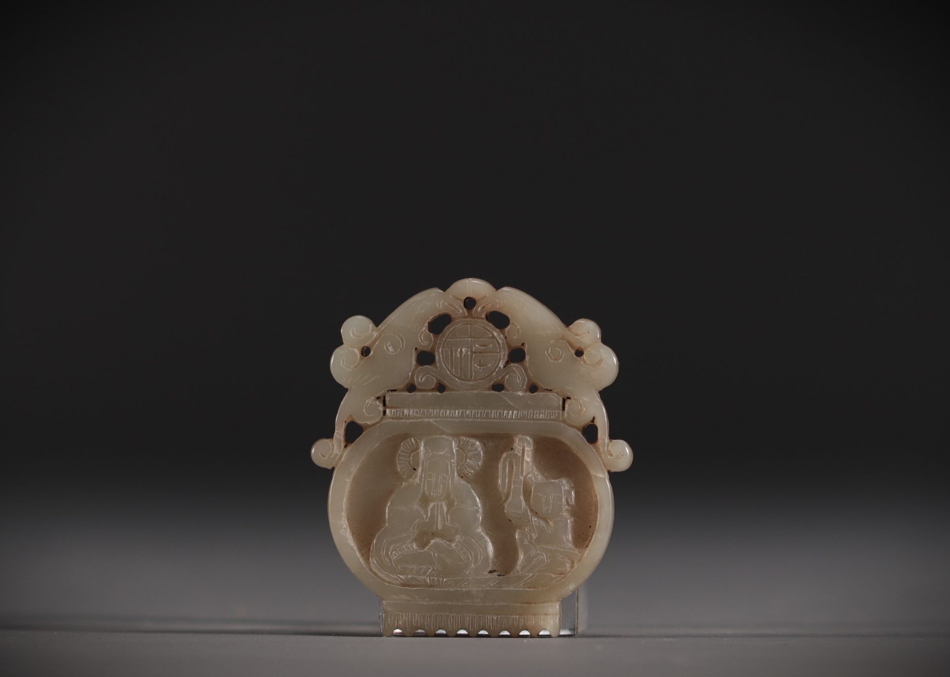 China - White jade pendant with Guanyin design, Ming period.