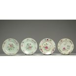 China - Set of four Famille Rose porcelain plates decorated with flowers.