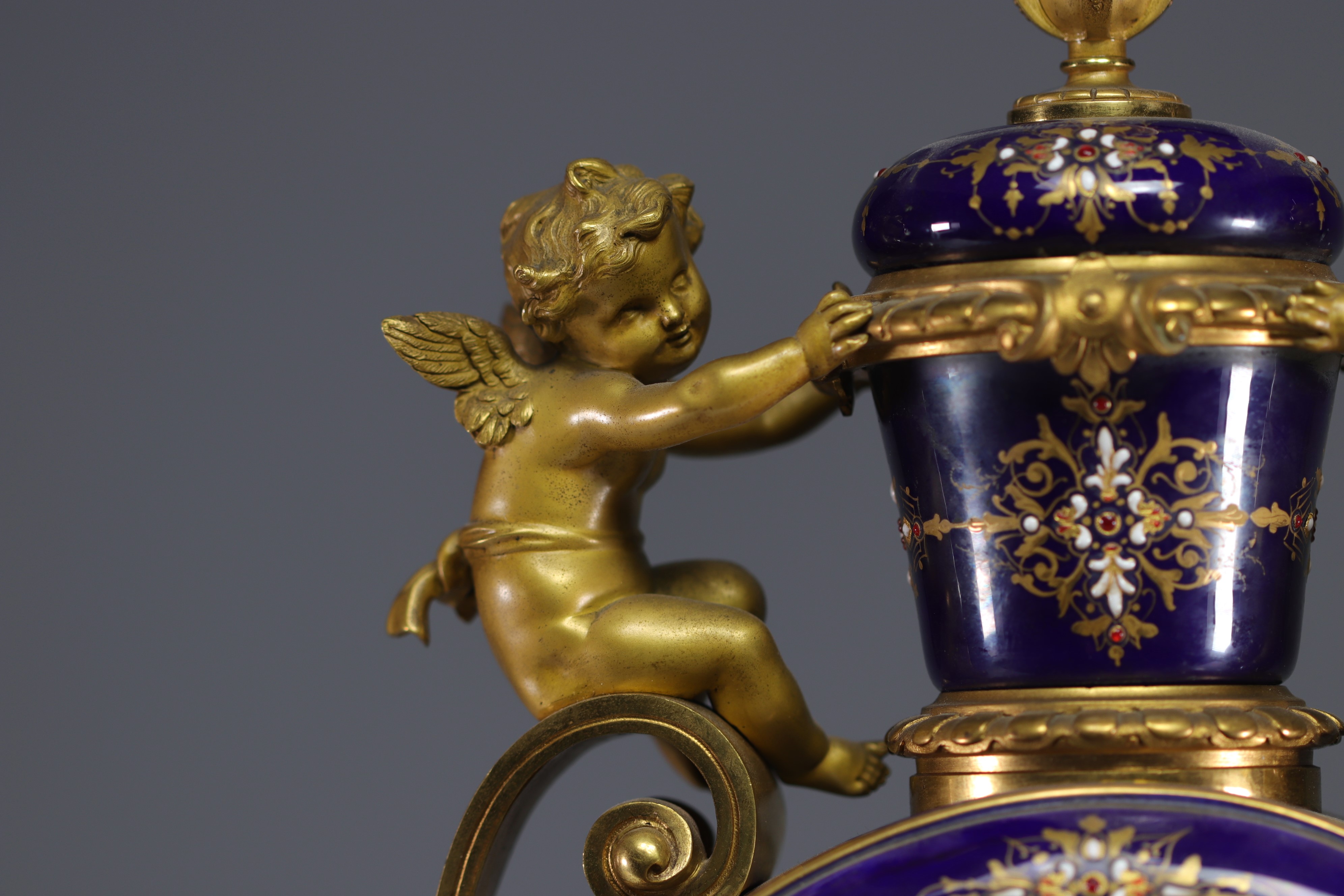 A rare Sevres porcelain and gilt bronze clock decorated with cherubs. - Image 8 of 8