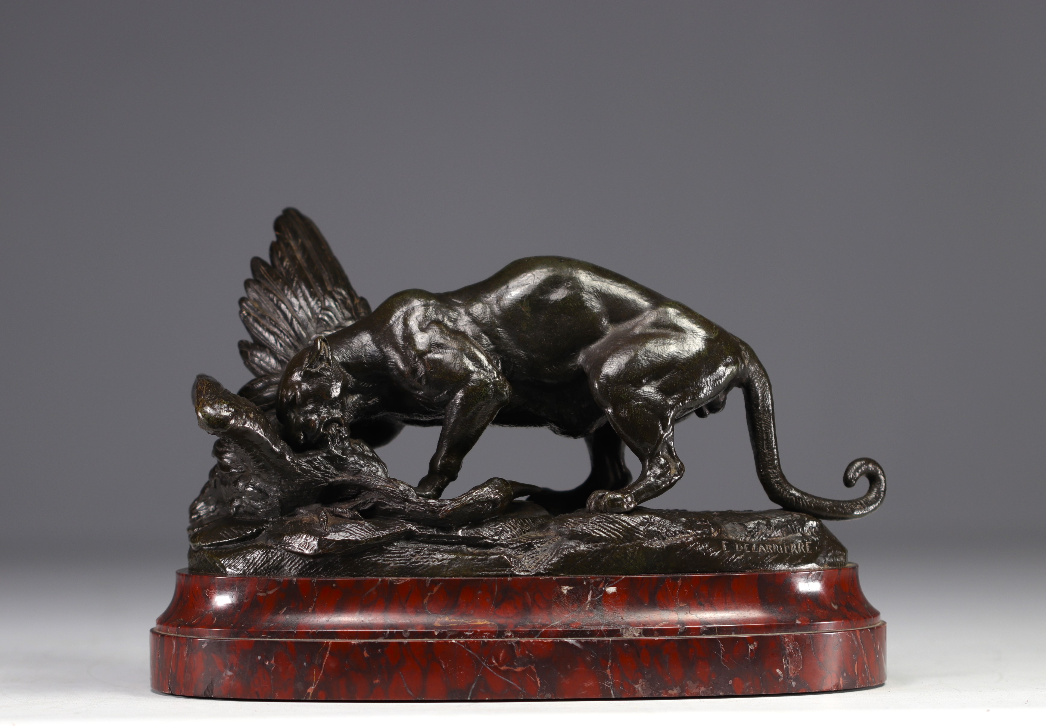 Paul Edouard DELABRIERRE (1829-1910) "Panther devouring a pelican" Bronze sculpture.