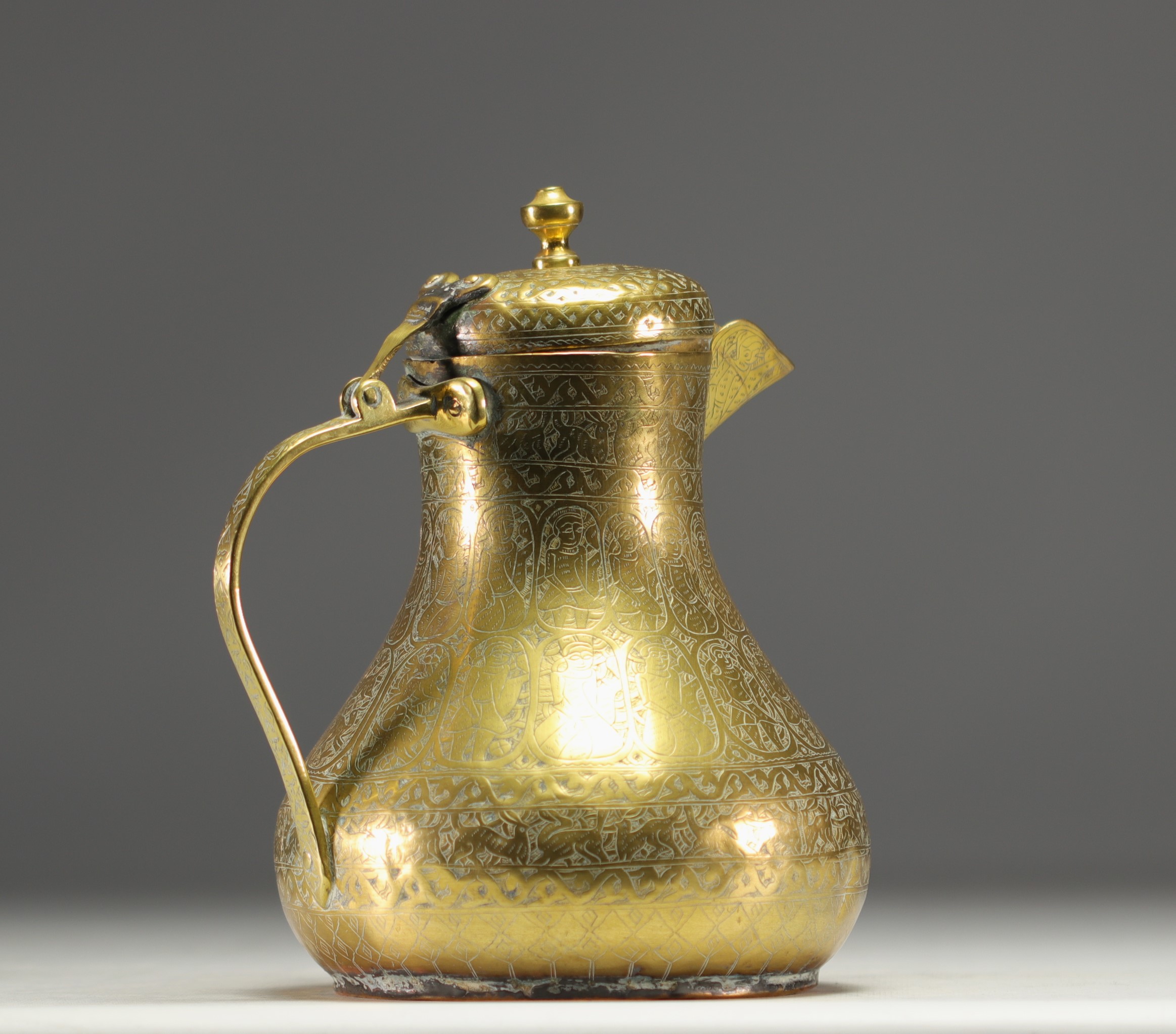 Persian coffee pot in chased brass with animal and figure motifs. - Image 2 of 3