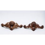 Pair of Black Forest coat hangers decorated with bear heads and edelweiss.