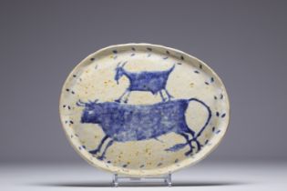 Glazed ceramic tray decorated with bulls in the style of Picasso, signed J.V., circa 1950.