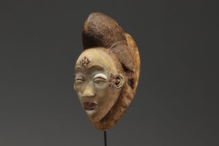 Gabon - Punu mask in carved wood.