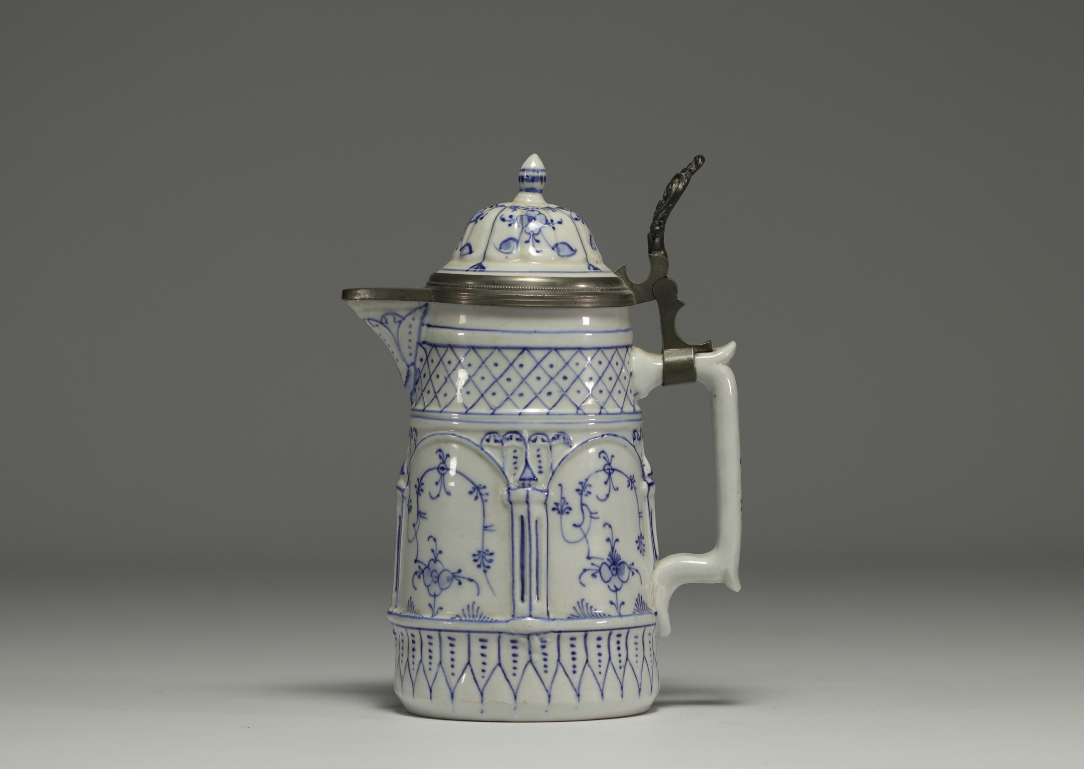Rauenstein porcelain jug with white and blue decoration, pewter frame, 19th century. - Image 2 of 3