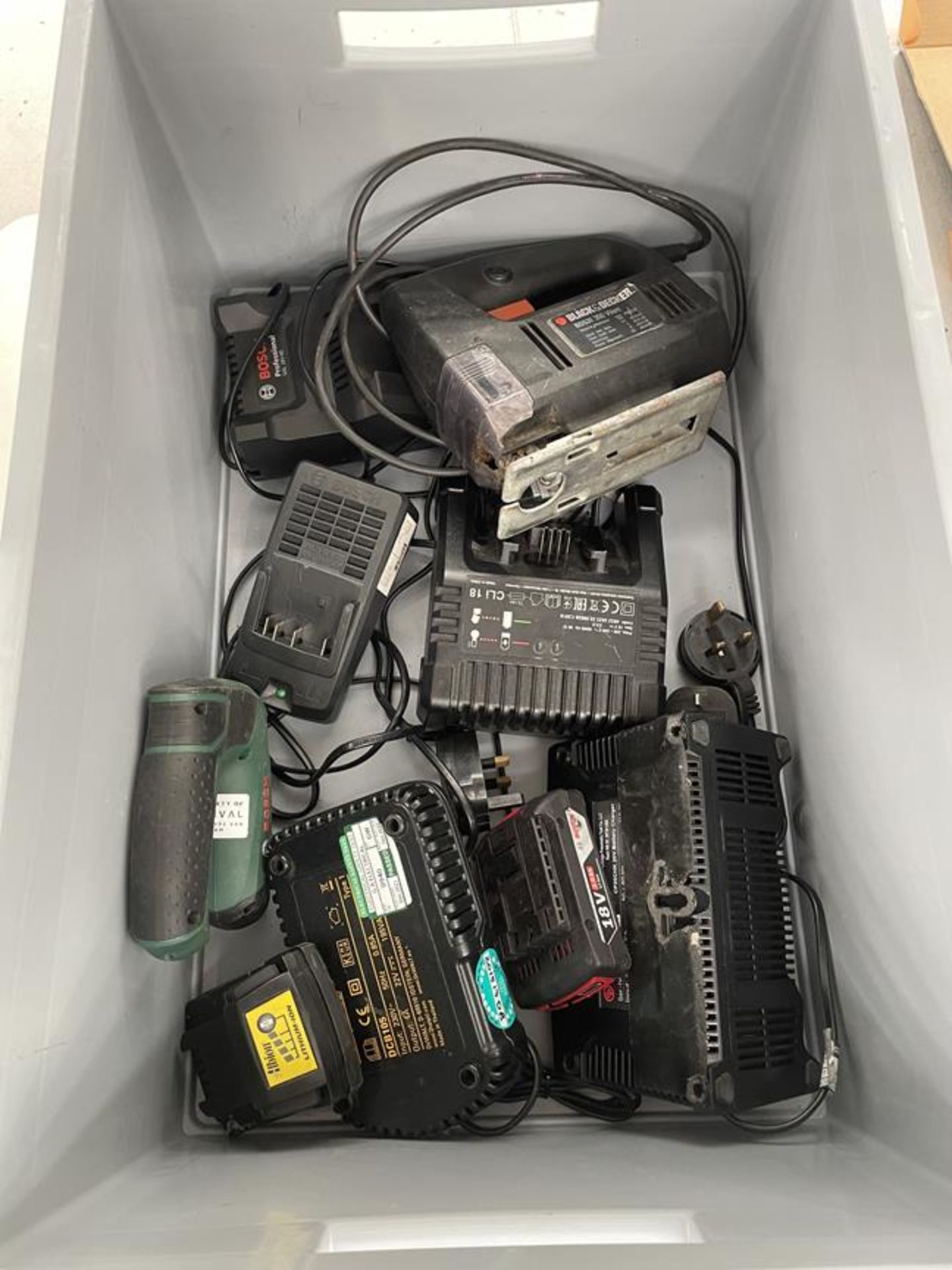 Box miscellaneous battery chargers, Bosch stapel gun and B&D jigsaw