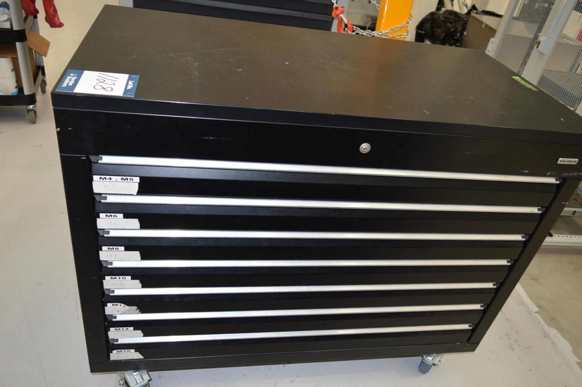 Dura, mobile multidrawer tool chest with assorted fittings, nuts, bolts, studs, washers, etc.