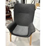 Cloth upholstered, high backed armchair