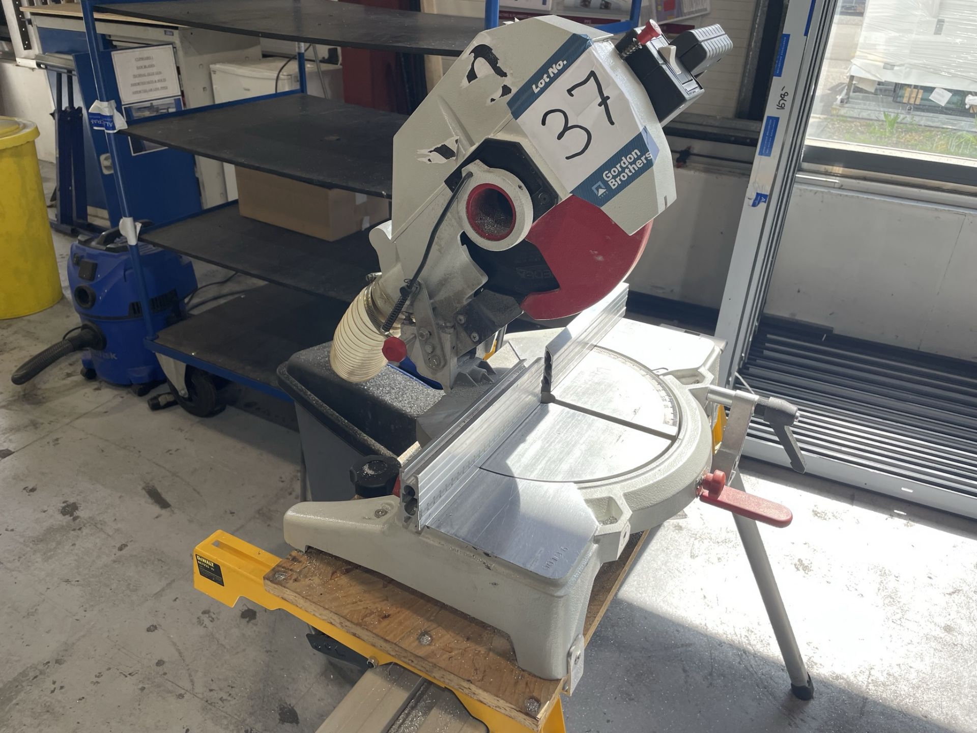 Pegic, R250 mitre cut off saw, Serial No. - (DOM: 2013) with aluminium feed stand and swarf bin