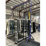 Metal framed, seventeen section vertical transporter rack, 2500 x 1200 x 3200mm approx. (contents