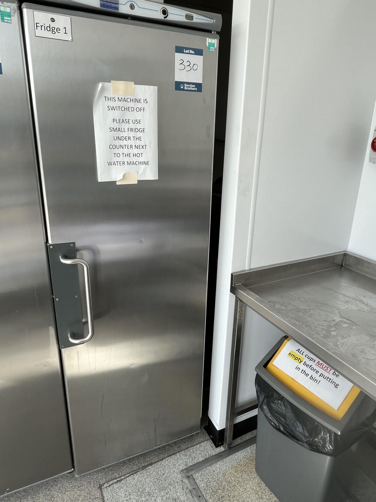 Modial Elite, upright stainless steel upright refrigerator (not in use)