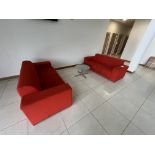 2x (no.) orange cloth upholstered two seater sofas and glass circular occasional table