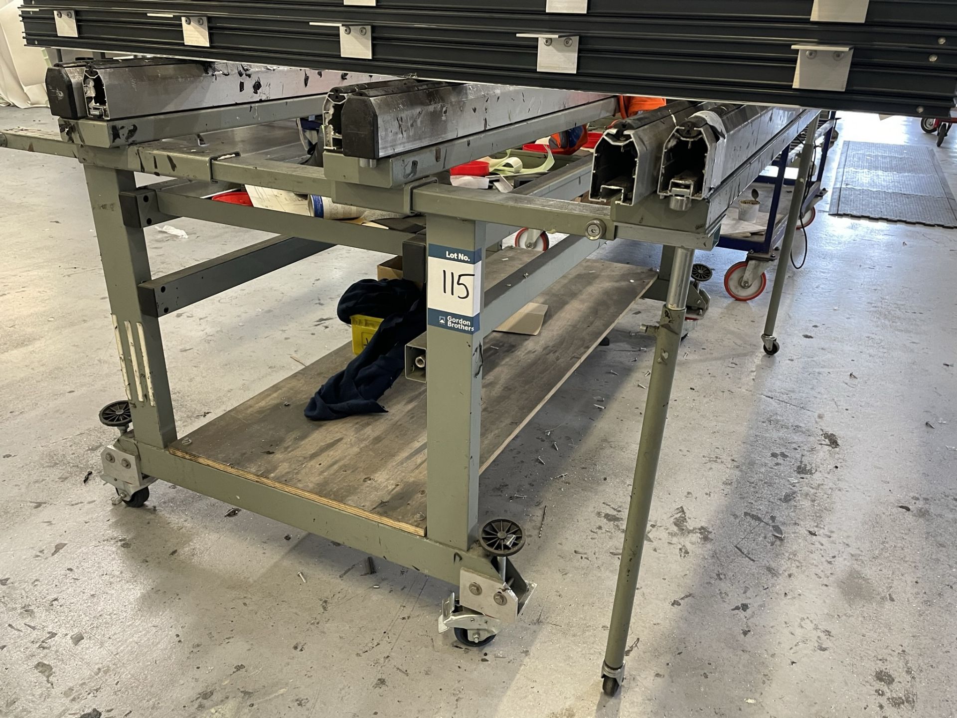 Mobile/expandable window frame fabrication bench, 2000 x 1400mm approx. (excluding contents)