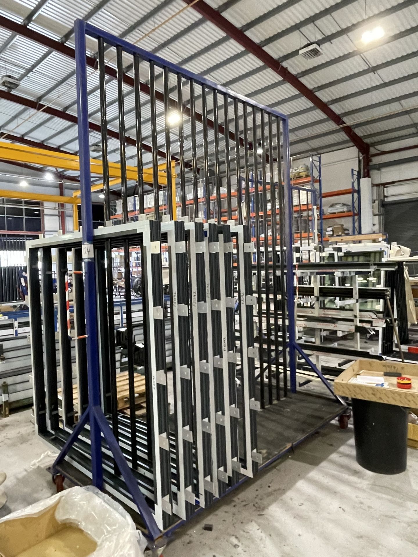 Metal framed, seventeen section vertical transporter rack, 2500 x 1200 x 3200mm approx. (contents - Image 2 of 2