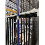 Metal framed, seventeen section vertical transporter rack, 2500 x 1200 x 3200mm approx. (contents