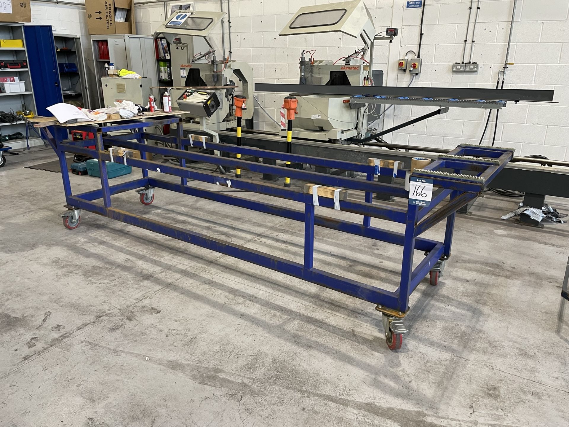 Metal framed assembly trolley, 3600 x 850 x 900mm approx.