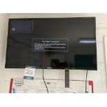 Samsung, 40" wall mounted flat screen monitor with remote control