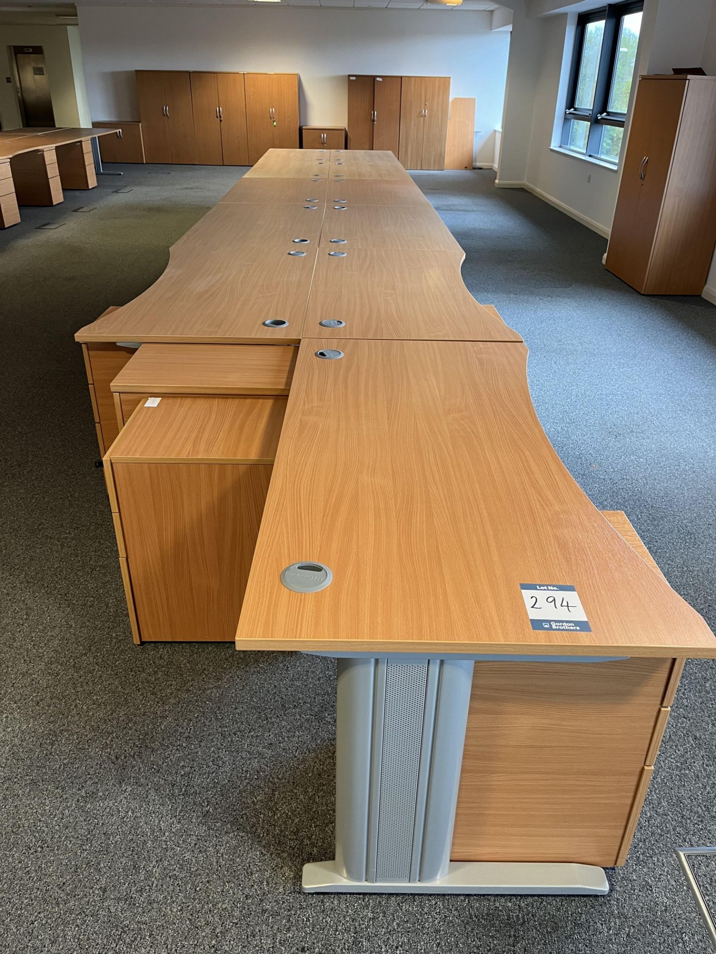 3x (no.) shaped front light oak veneer desks, 8x (no.) rectangular light oak veneer desks and 13x (