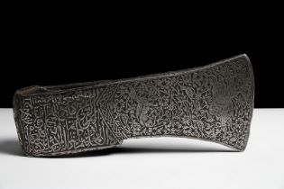 An Islamic Indian/ Persian Iron Tabar Battle Axe with Islamic Calligraphy and Floral and Animal