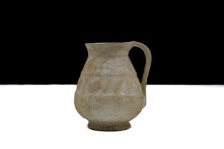 An Islamic Miniature Ceramic Jug from the 12th Century.