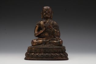 A Chinese Tibetan Bronze Gilted Buddhist Statue. H: Approximately 19.5cm L: Approximately 15cm
