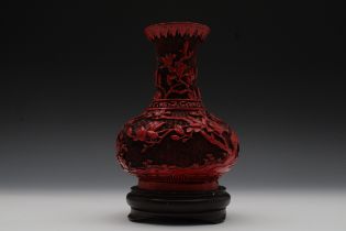 A Chinese Cinnabar Lacquer Vase with a Wooden Base. H with Stand: Approximately 21cm H: