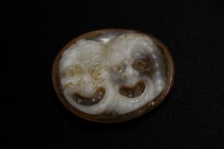 A Roman Cameo of the Ancient Theatre Mask of Tragedy and Comedy from the 1st Century A.D. L: