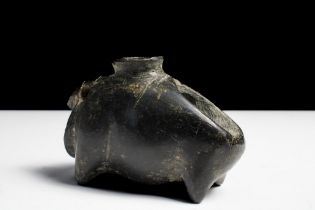 A Black Stone Steatite Vessel in the Form of a Bull in the Style of Mesopotamia of the 2nd