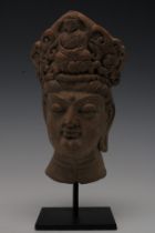 A Rare Terracotta Head Fragment Possibly Ancient on a Black Metal Base. H: Approximately 22cm