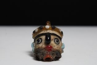 A Glass Head Pendant in the Style of Roman or Phoenicia Levant Area. H: Approximately 4.2cm