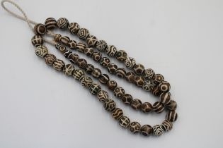 A Tibetan Pumtek Petrified Wood Stone Dzi Beads Long Necklace. L: Approximately 96cm Each Bead: