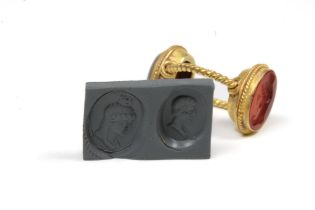 A Gold Double Headed Intaglio Ring Representing Tyne in Red Carnelian on One Head and a Cameo